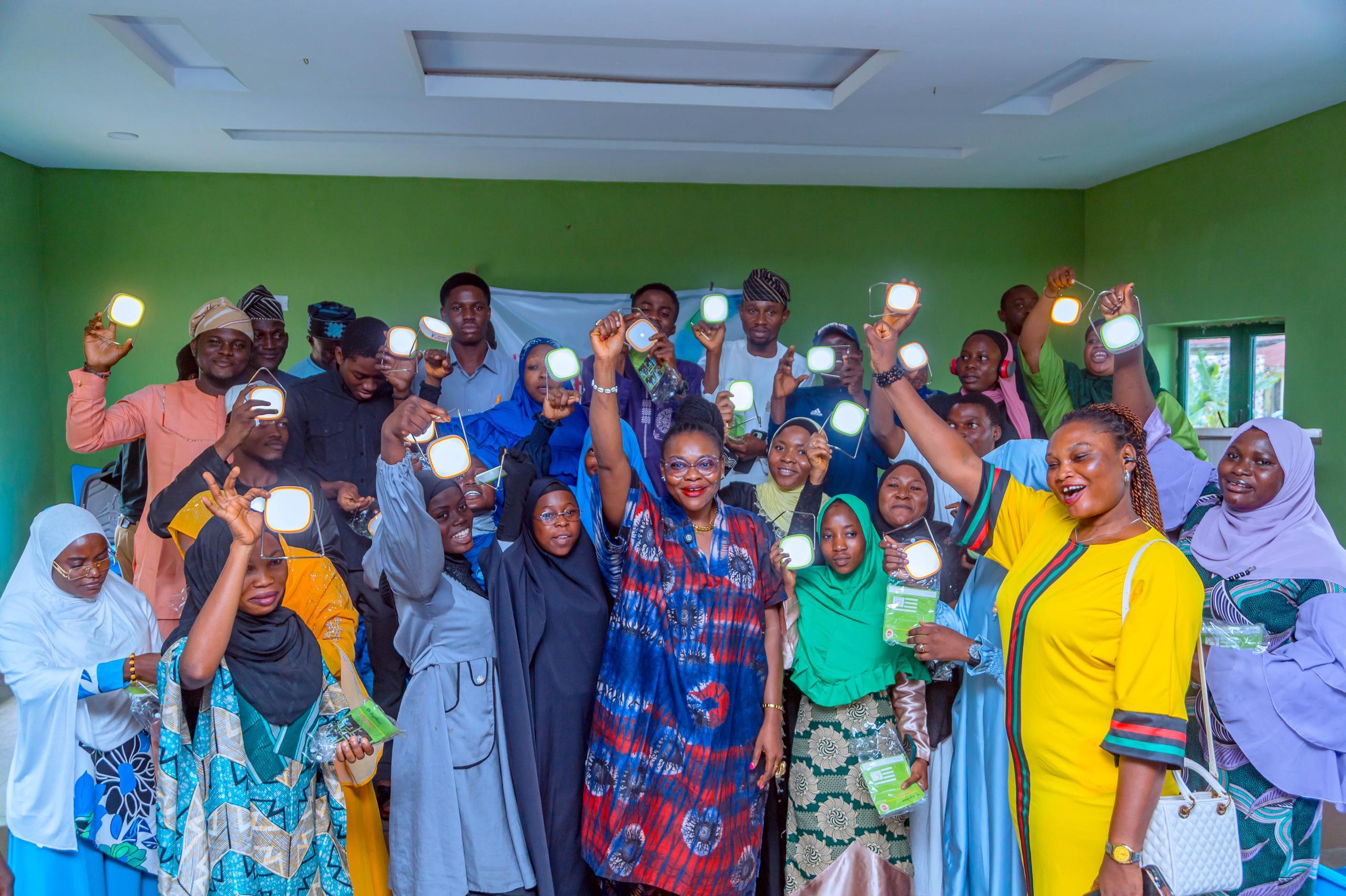 Students receiving solar lanterns under the One Child One Lantern initiative in Osun State