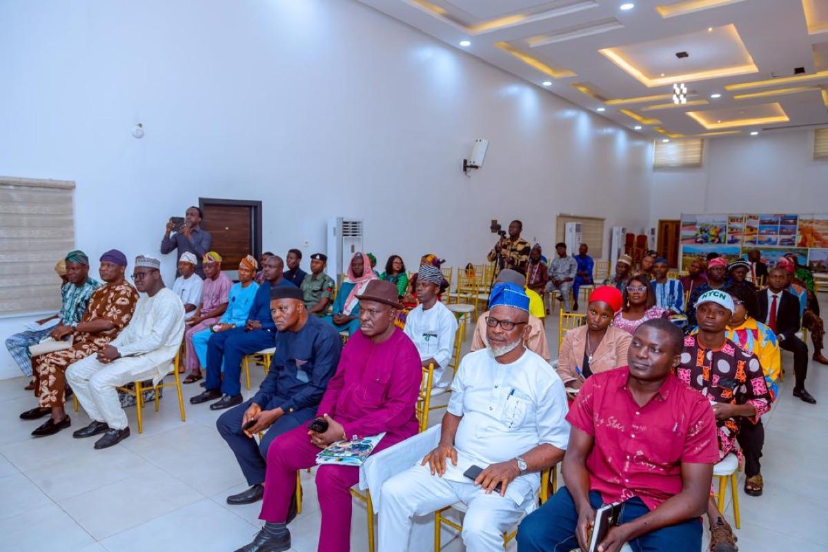 Large gathering of community members, government representatives, and civil society groups attending an Osun State climate action programme event in Osogbo