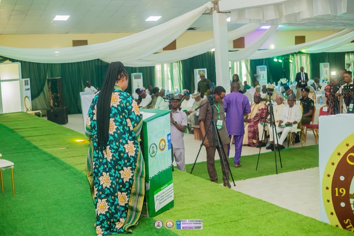 Prof. Chinwe Obuaku-Igwe at the podium of a major green summit conference, speaking on Osun State's climate action programmes alongside international development partners